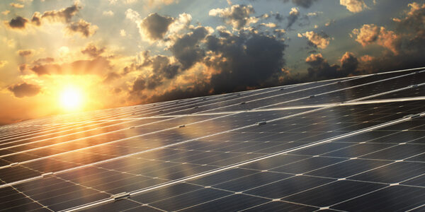 solar panel with sunset background. concept clean energy
